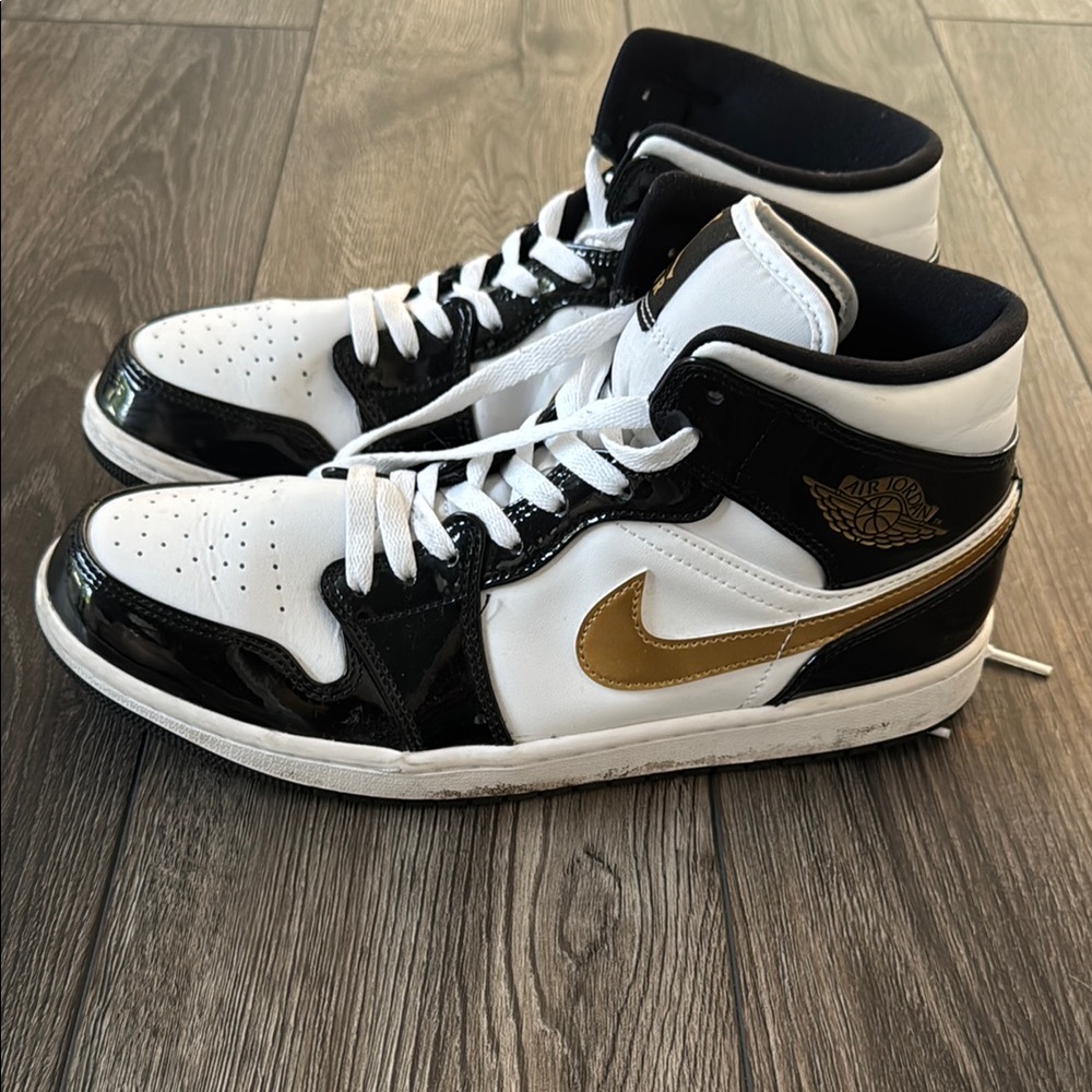 Nike Air Jordan Black and Gold Sneakers Iconic Design